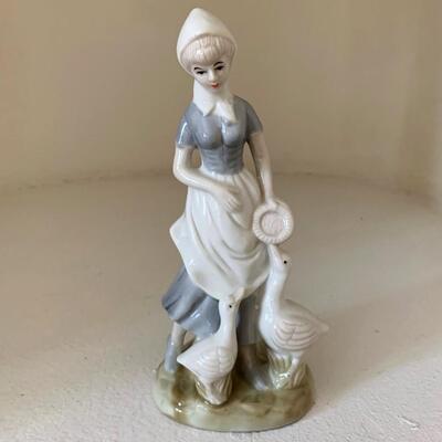 Porcelain Woman with Geese Figurine
