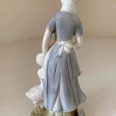 Porcelain Woman with Geese Figurine