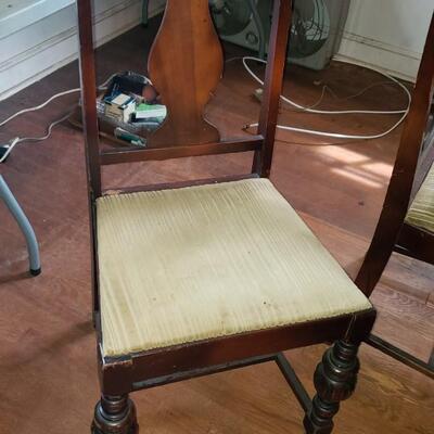 Antique table with five chairs
