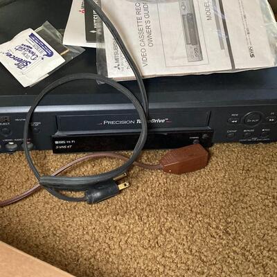 Lot 59:  VHS tapes and devices