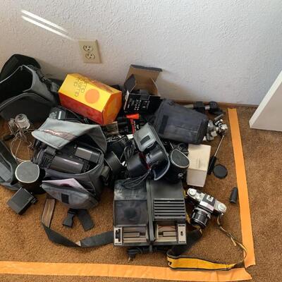 Lot 107:  Cameras and accessories