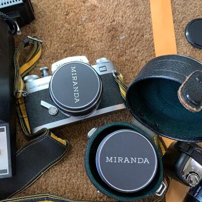 Lot 107:  Cameras and accessories