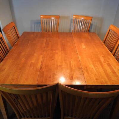 Dining table with tuck away leaf