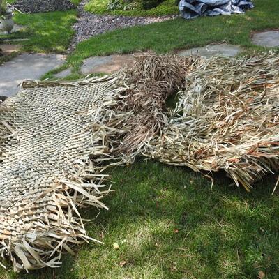 Woven palm leaf duck blind