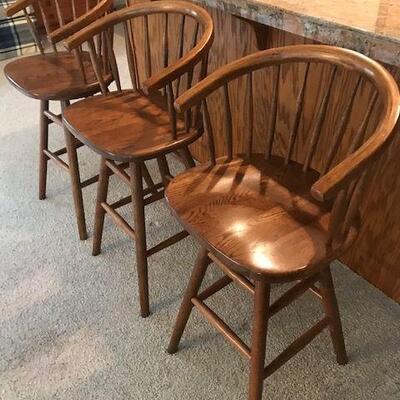 Three Oak Swivel Bar Stools