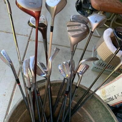 Lot 144:  Loose golf clubs