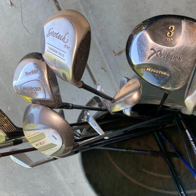 Lot 144:  Loose golf clubs