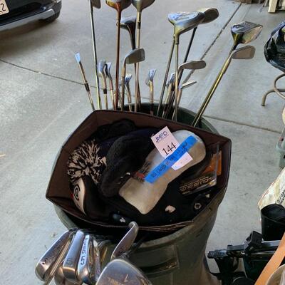 Lot 144:  Loose golf clubs
