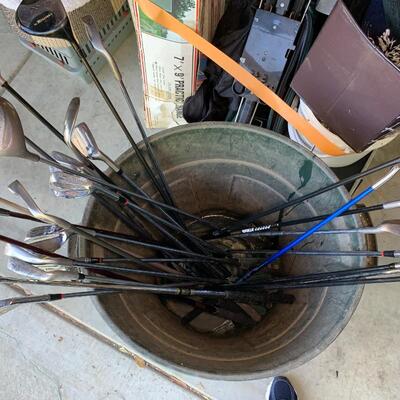 Lot 144:  Loose golf clubs