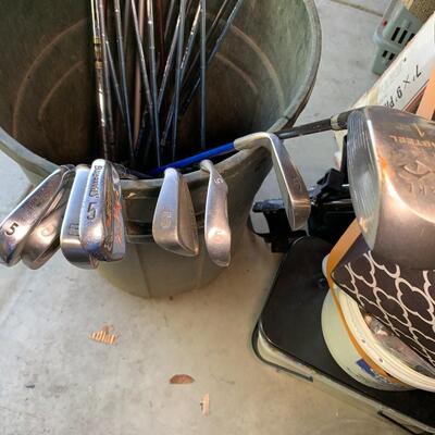 Lot 144:  Loose golf clubs