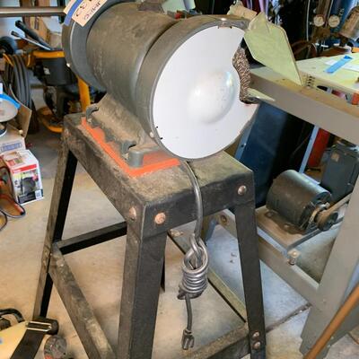 Lot 132: Bench grinder and stand