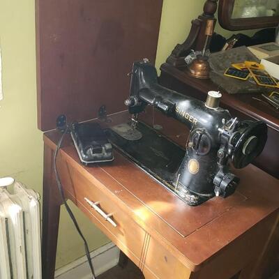 Antique Singer sewing machine and cabinet