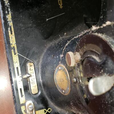 Antique Singer sewing machine and cabinet