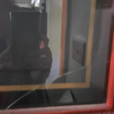 Antique clock, glass is cracked