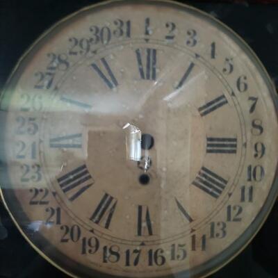 Antique clock, glass is cracked
