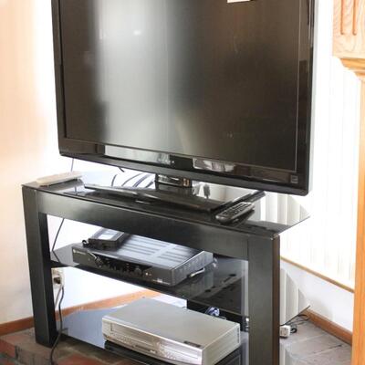 Lot 145 Dynex TV, Stand & VHS/DVD Combo (Cable Box not included)