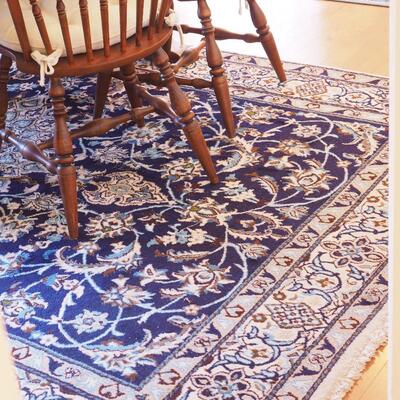 Lot 100  Large area rug unknown fiber Persain style design blues and browns