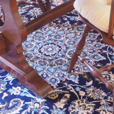Lot 100  Large area rug unknown fiber Persain style design blues and browns