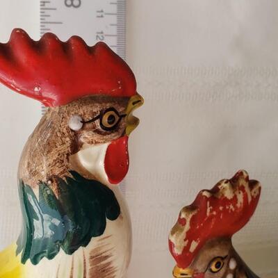 2 chickens,  rooster and hen?