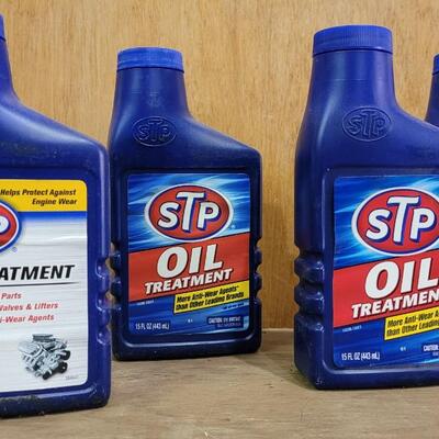 Lot 9: (5) Unused Full Oil Treatments