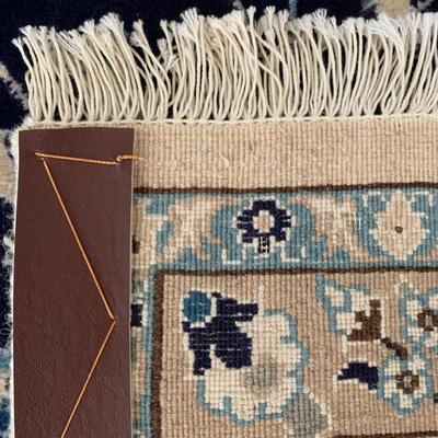 Lot 113 Persian Style area rug with night sky blue and light tan borders