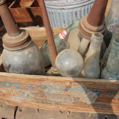 WOODEN CRATE AND BOTTLES