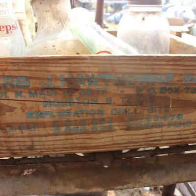 WOODEN CRATE AND BOTTLES