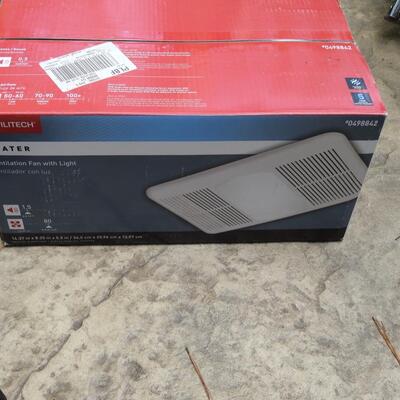 New in the box. Bathroom heater/fan/light