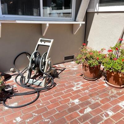 Lot 193- Empty pots, watering can, live succulent