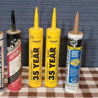 Lot 102: Window Sealant, (2) White Silicone, All Weather Roof Cement ect.