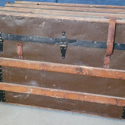 Lot 115: Antique Steamer Trunk with Remnant leather Straps & Leather Handles (one handle broken)  34.5" Ã— 19" Ã— 22.25"
