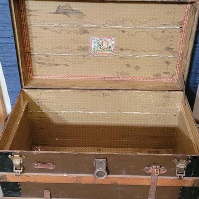 Lot 115: Antique Steamer Trunk with Remnant leather Straps & Leather Handles (one handle broken)  34.5" Ã— 19" Ã— 22.25"