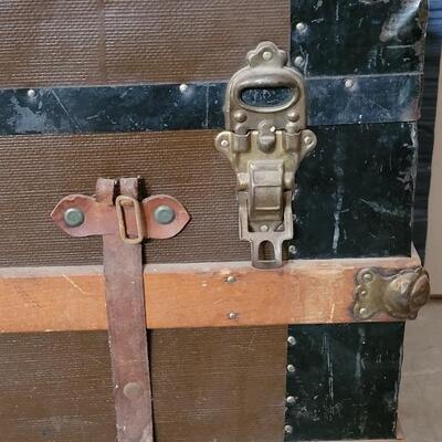 Lot 115: Antique Steamer Trunk with Remnant leather Straps & Leather Handles (one handle broken)  34.5" Ã— 19" Ã— 22.25"
