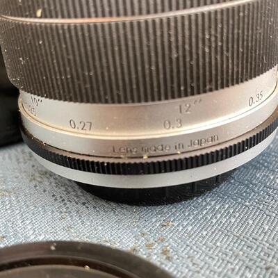 Lot 94 Huge lot of film and digital cameras, manuals, lens, cases, Binoculars, book