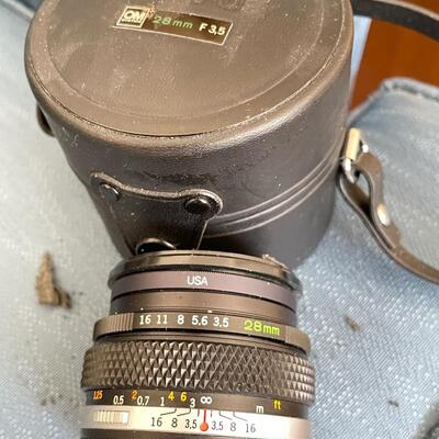 Lot 94 Huge lot of film and digital cameras, manuals, lens, cases, Binoculars, book