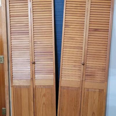 Lot 125: Set of Bi-Fold  Wood Doors
