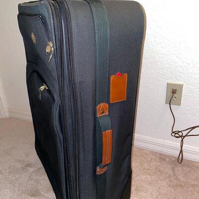 Lot 64  Large Suitcase