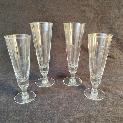 Lot 86 Four Champagne Glasses