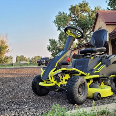 Lot 143: RYOBI RM480EX Electric Riding Lawnmower w/ Collection System and Charger COMPLETE & TESTED A+