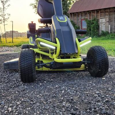 Lot 143: RYOBI RM480EX Electric Riding Lawnmower w/ Collection System and Charger COMPLETE & TESTED A+