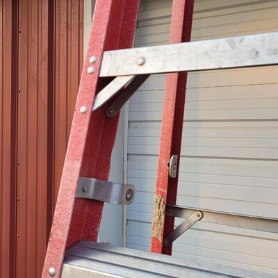 Lot 145: 9.5 Foot Fiberglass and Aluminum Ladder 