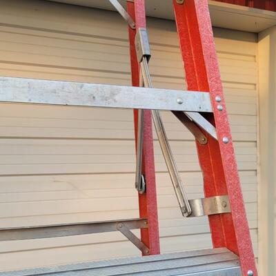 Lot 145: 9.5 Foot Fiberglass and Aluminum Ladder 