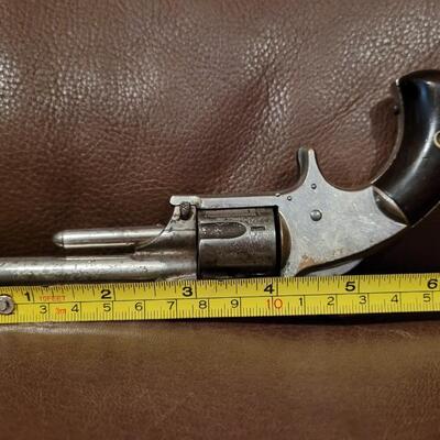 Lot 181: Antique 1878 J.W. MARLIN .30 Cal Short Rimfire Spur Trigger Bird's Eye Butt Revolver
