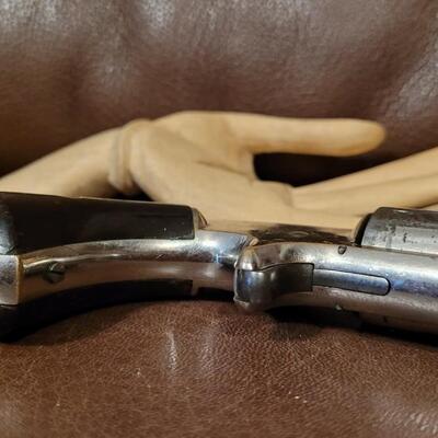 Lot 181: Antique 1878 J.W. MARLIN .30 Cal Short Rimfire Spur Trigger Bird's Eye Butt Revolver