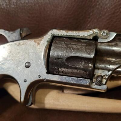 Lot 181: Antique 1878 J.W. MARLIN .30 Cal Short Rimfire Spur Trigger Bird's Eye Butt Revolver