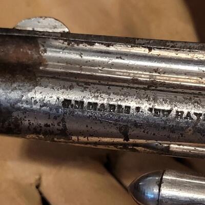 Lot 181: Antique 1878 J.W. MARLIN .30 Cal Short Rimfire Spur Trigger Bird's Eye Butt Revolver