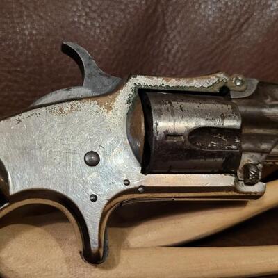Lot 181: Antique 1878 J.W. MARLIN .30 Cal Short Rimfire Spur Trigger Bird's Eye Butt Revolver