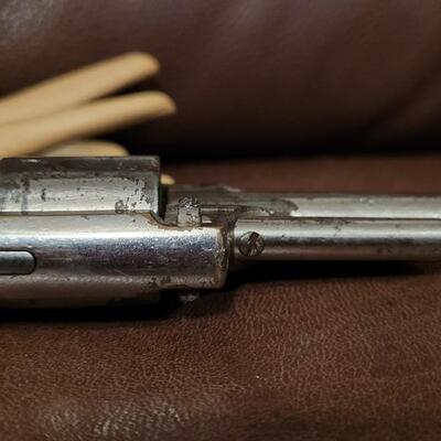 Lot 181: Antique 1878 J.W. MARLIN .30 Cal Short Rimfire Spur Trigger Bird's Eye Butt Revolver