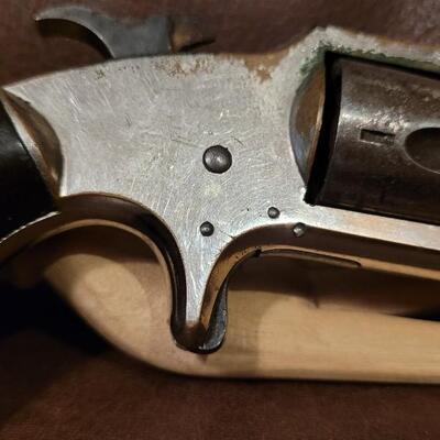Lot 181: Antique 1878 J.W. MARLIN .30 Cal Short Rimfire Spur Trigger Bird's Eye Butt Revolver