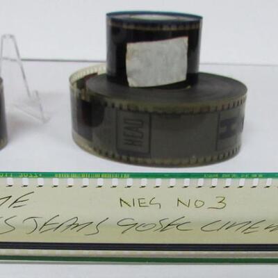 35 mm Film Reels, 1 Appears to be Basketball, 1 Is Indecent Proposal Trailer, 1 is USAF Wedding Only Just Begun, 1 Unknown